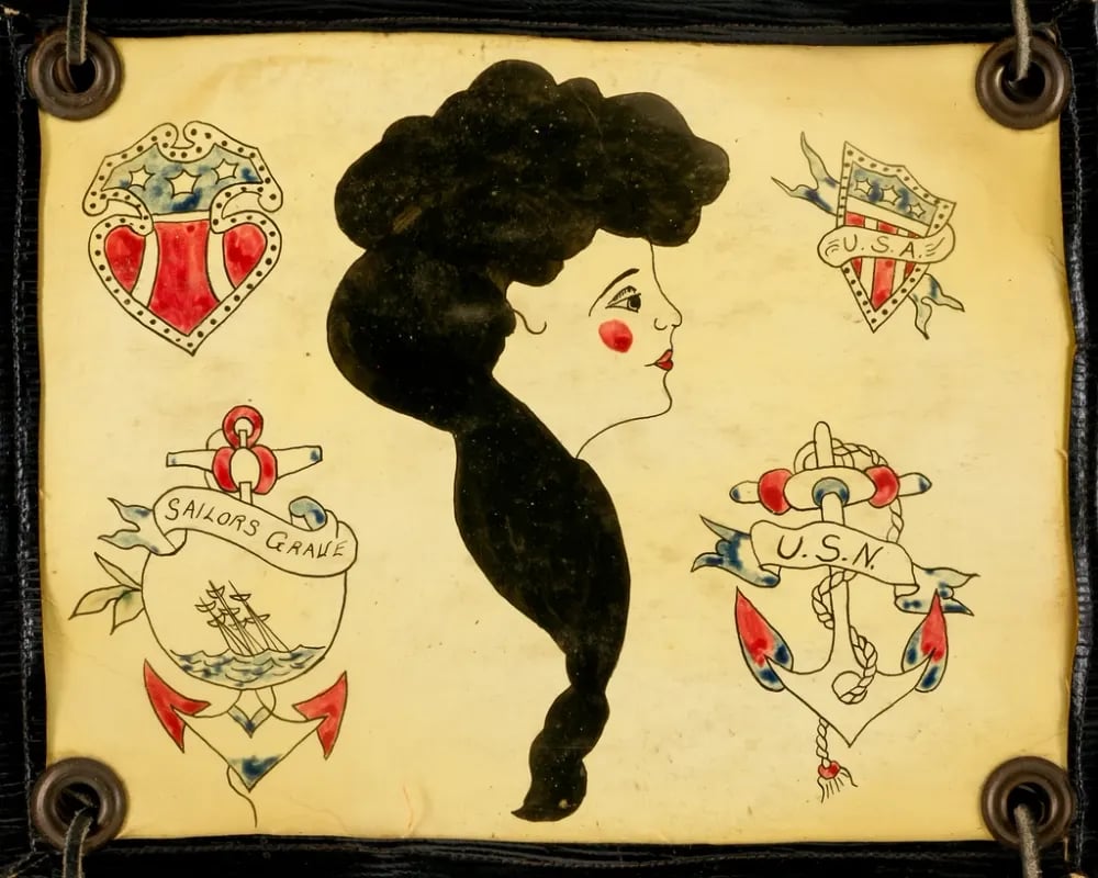 Traditional flash sheet with anchors, hearts and a woman's profile