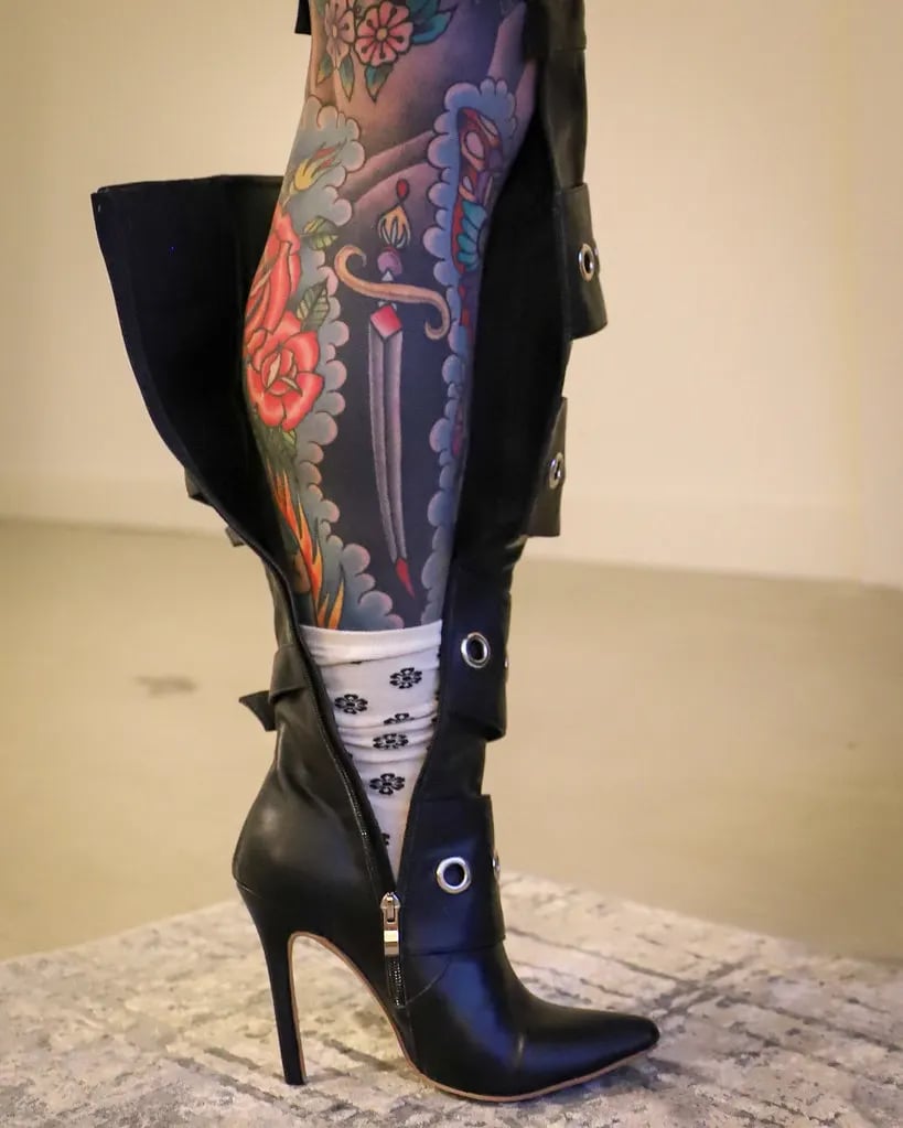 Leg sleeve with a dagger and red flowers